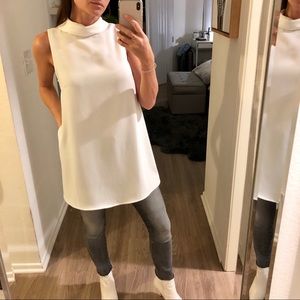 White sleeveless blouse